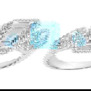 Blue Topaz Three Stone Ring 3.85 Carats Sterling Silver: Accompanied by Gemological Appraisal by GIA GG/AJP Appraised value: $450 All gemstones are natural in origin 3 Blue Topazes = 3.85 ct Metal: Rhodium Plated Sterling Silver Ring Size: 6 US Resizing on
