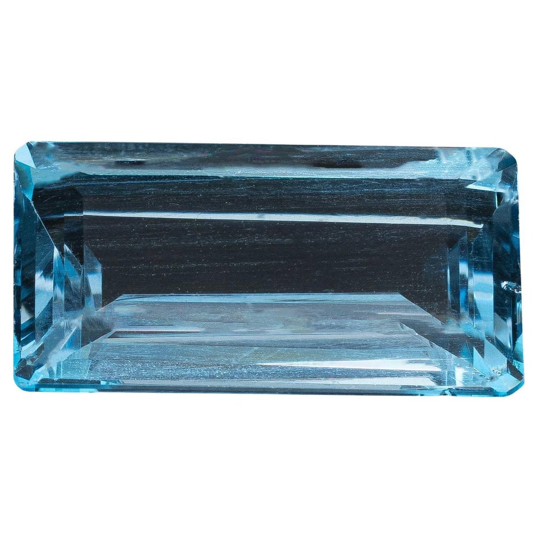 London Blue Topaz 7.9 Carat Emerald Cut Loose Gemstone: This 7.90 carat London Blue Topaz captivates with its deep teal-blue color, reminiscent of the mysterious depths of the ocean. Precision-cut in a classic emerald cut, this gemstone features elegant st