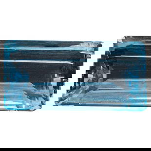 London Blue Topaz 7.9 Carat Emerald Cut Loose Gemstone: This 7.90 carat London Blue Topaz captivates with its deep teal-blue color, reminiscent of the mysterious depths of the ocean. Precision-cut in a classic emerald cut, this gemstone features elegant st