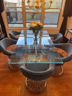 1970's Art Deco Glass and Chrome dining table: Stunning VINTAGE RECTANGLE Art deco glass and chrome dining table with six velvet swivel chairs. This table set ORDERED and shipped from the manufacturer in California.