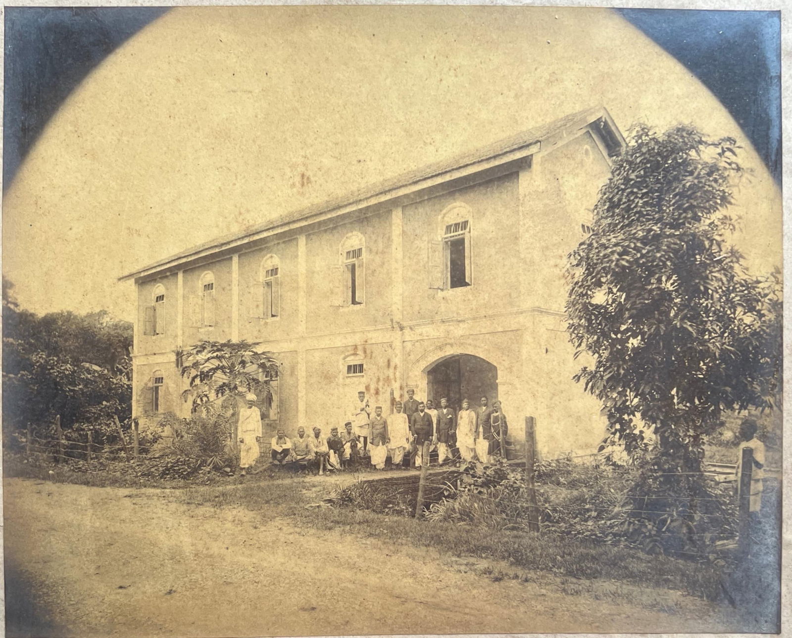 EARLY PHOTOGRAPH OF A COLONIAL-ERA BUILDING WITH GROUP PORTRAIT (1 of 1)