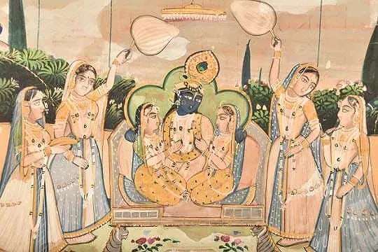 18TH/19TH CENTURY INDIAN BUNDI SCHOOL A MINIATURE PAINTING FROM THE BUNDI SCHOOL: 18TH/19TH CENTURY INDIAN BUNDI SCHOOL A MINIATURE PAINTING FROM THE BUNDI SCHOOL DEPICTING RADHA AND KRISHNA BEING WORSHIPPED BY THE GOPIS, CAPTURING A MOMENT OF DEVOTION AND CELEBRATION, PAINT ON CAR
