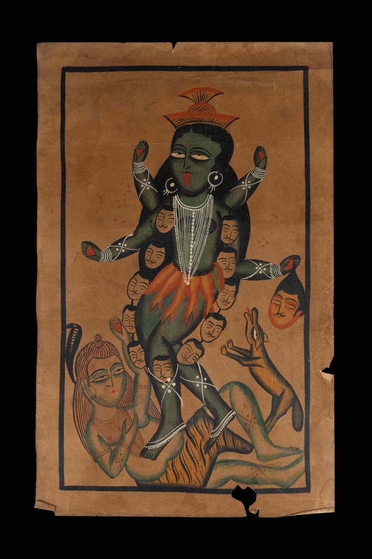 EARLY 20TH CENTURY KALIGHAT PAINTING GODDESS KALI IN FIERCE FORM STANDING ON SHIVA: EARLY 20TH CENTURY KALIGHAT PAINTING GODDESS KALI IN FIERCE FORM STANDING ON SHIVA THIS EARLY 20TH-CENTURY KALIGHAT PAINTING DEPICTS GODDESS KALI IN HER FEROCIOUS FORM, STANDING OVER LORD SHIVA, A