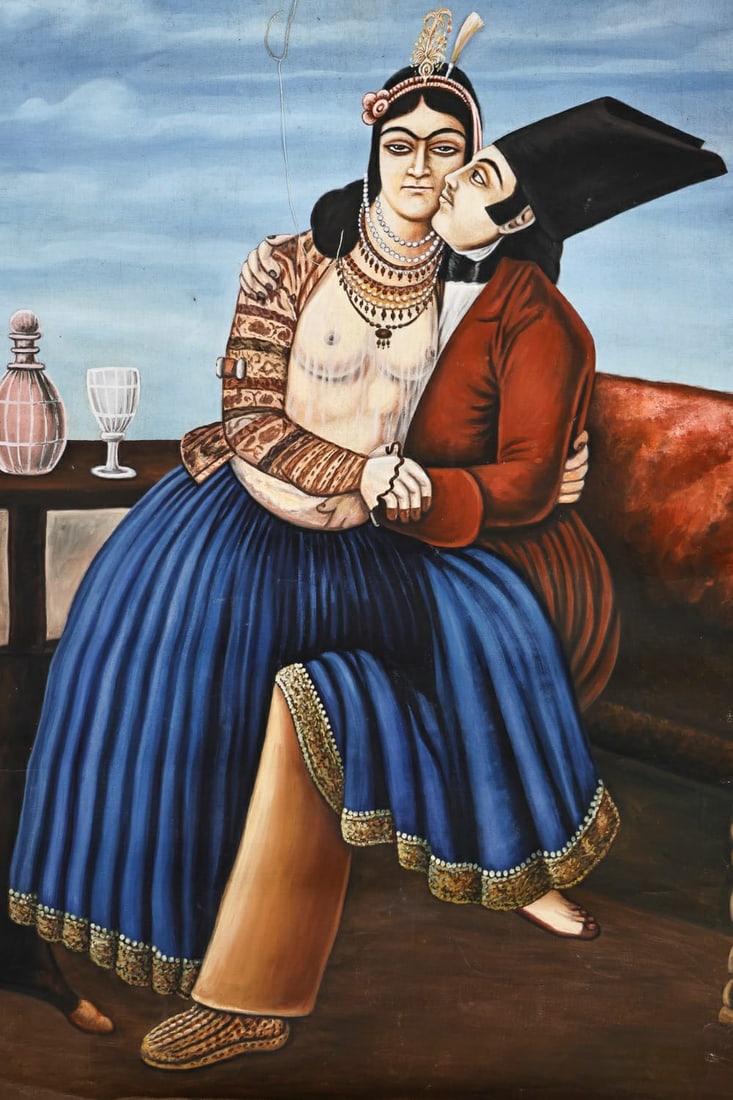EARLY 20TH CENTURY QAJAR OIL ON CANVAS, 26 X 38 INCHES: EARLY 20TH CENTURY QAJAR OIL ON CANVAS, 26 X 38 INCHES EARLY 20TH CENTURY QAJAR OIL ON CANVAS, DEPICTING A SEATED ROYAL COUPLE IN AN INTIMATE EMBRACE, THE WOMAN WEARING A JEWELED HEADDRESS WITH