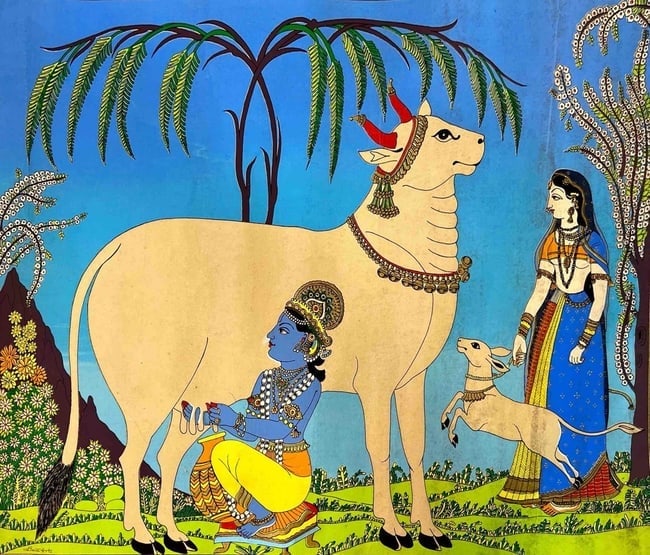 KRISHNA WITH COW - CELEBRATION OF DIVINE RURAL LIFE. 27 X 21 IN: KRISHNA WITH COW - CELEBRATION OF DIVINE RURAL LIFE. SIZE: 27 _ 21 IN. DESCRIPTION: THIS VIBRANT AND STYLIZED PAINTING DEPICTS LORD KRISHNA, THE DIVINE COWHERD, MILKING A COW UNDER THE SHADE OF A