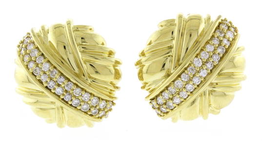 Jose Hess Diamond and Gold Earrings: From Jose Hess, each earring has 29 diamonds. They have posts and clips.* Designer: Jose Hess* Metal: 18 karat yellow gold * Circa: 1980s * Gemstones: Diamonds * Diamond: 58=1 carat* Length: 7/8 inch