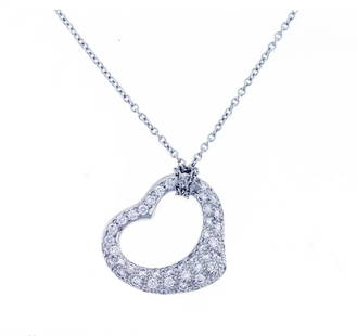 Tiffany & Co. Elsa Peretti Diamond Pendant Open Heart: Elsa Peretti's most celebrated icon. Pendant with pave diamonds in platinum. Size small, Diamonds=.47 carats, on a 16 inch chain. 6.1 grams