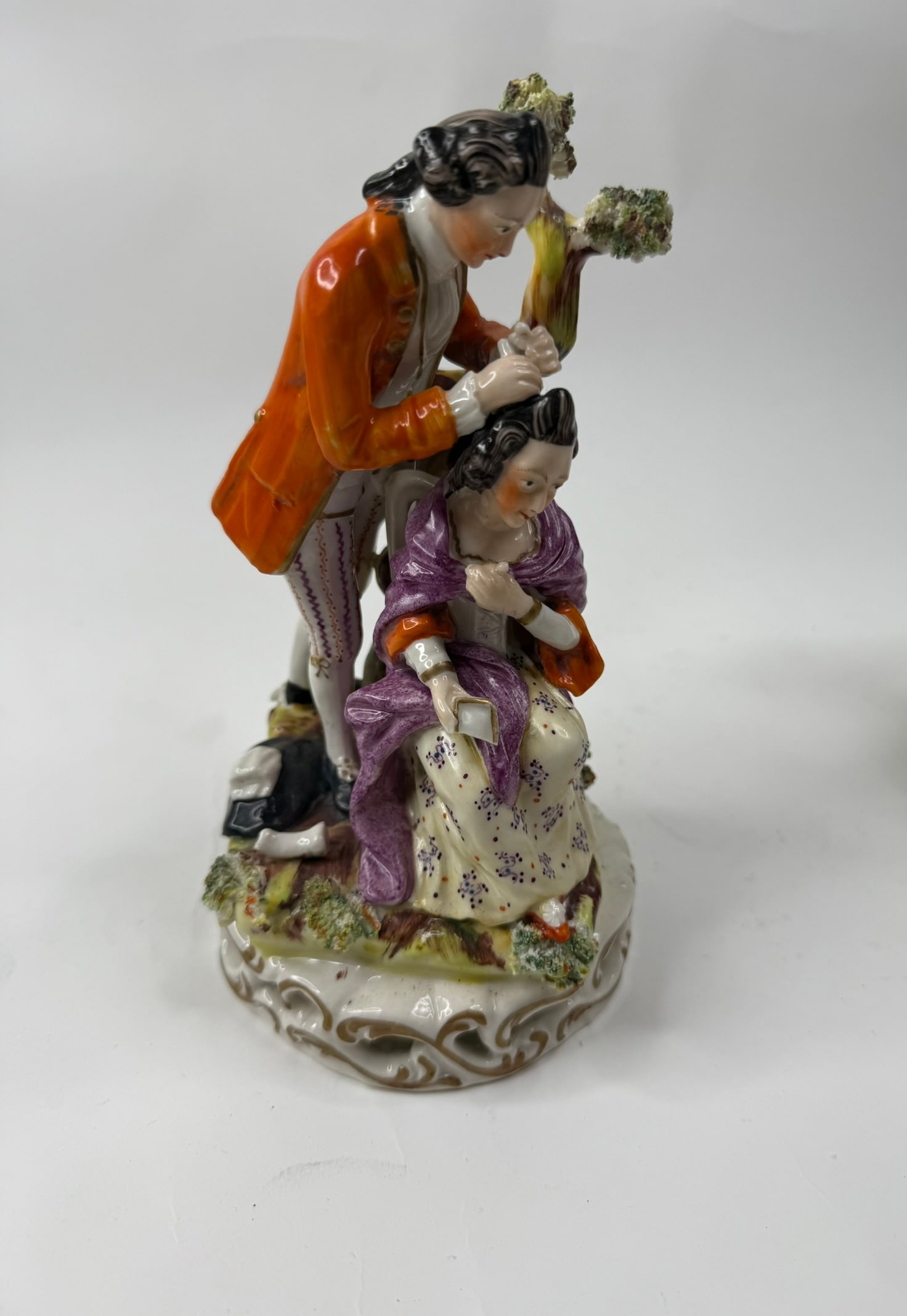 Pair 19th Century Dresden Style Figurines: Pair of Dresden style figurines, a man and woman on each figure. There are chips on both figures please see photos.