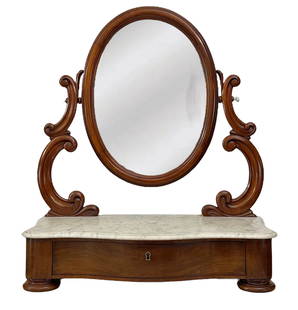 Rococo Revival Mahogany Dressing Mirror: American, Mid-19th Century Mahogany Victorian dressing mirror with white marble top, serpentine drawer, and original key. White pine and oak as secondary woods.