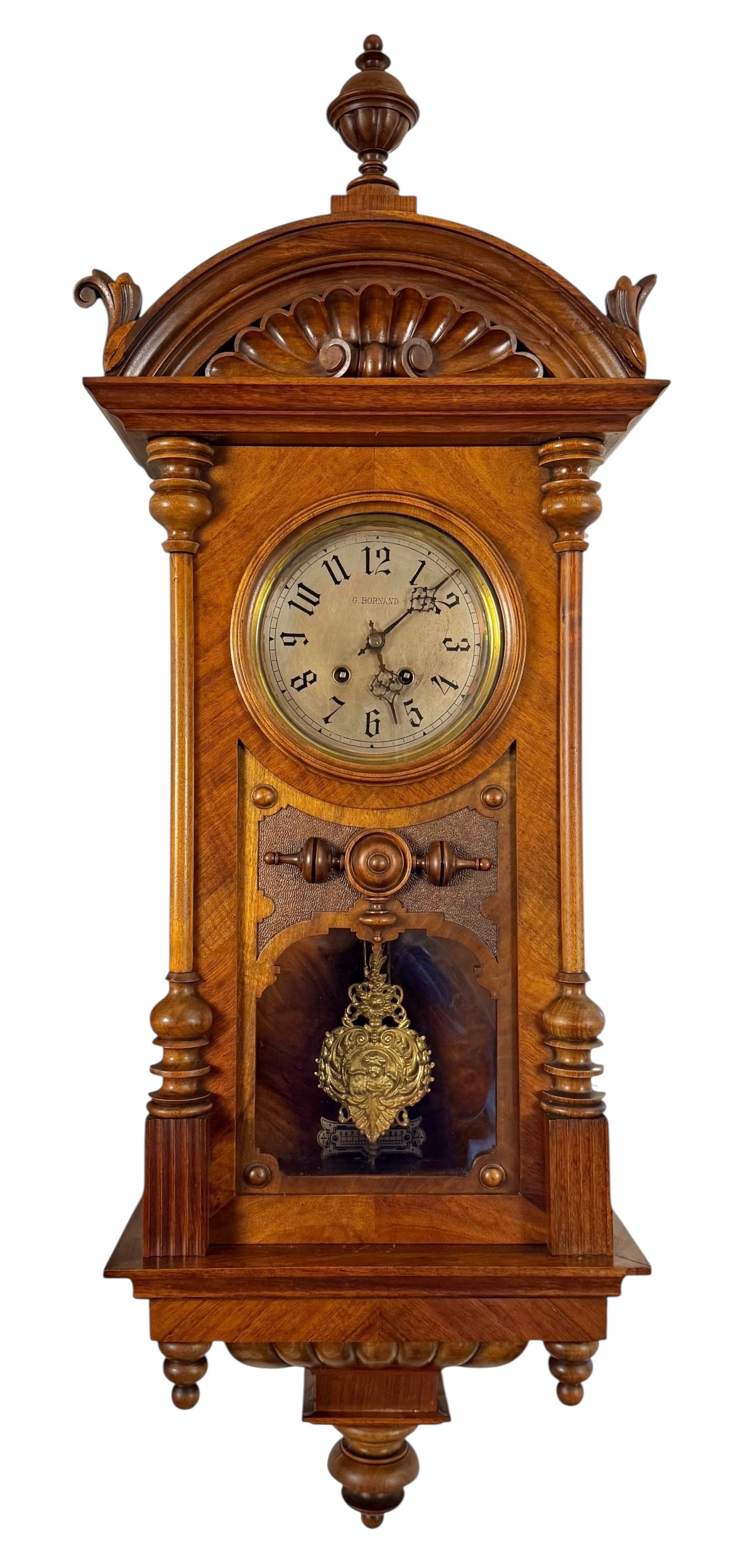 Wooden Wall Clock with face and flower carved pediment and basket carved base.  Full glass with (1 of 7)
