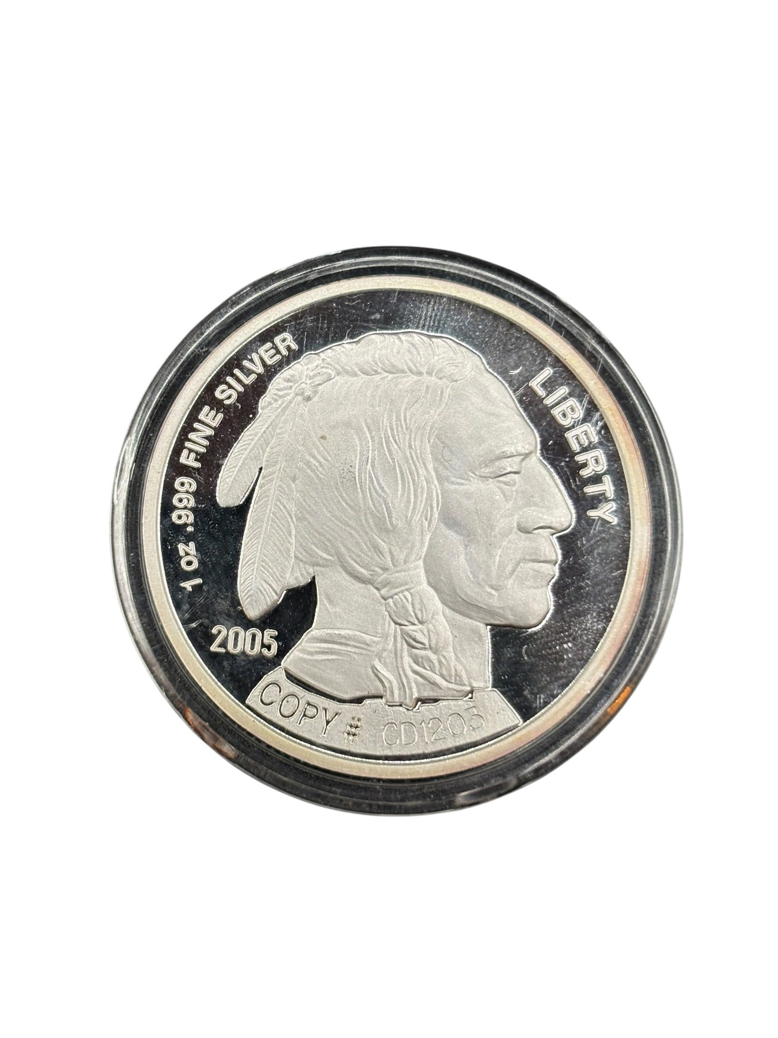 2005 Buffalo Round 1 Troy oz .999 Silver Coin: Buffalo Round 1 Troy oz .999 fine silver coin; 2005. Features the classic Buffalo/Indian Head design inspired by James Earle Frasers 1913 original. CONDITION: Good condition overall. Please see