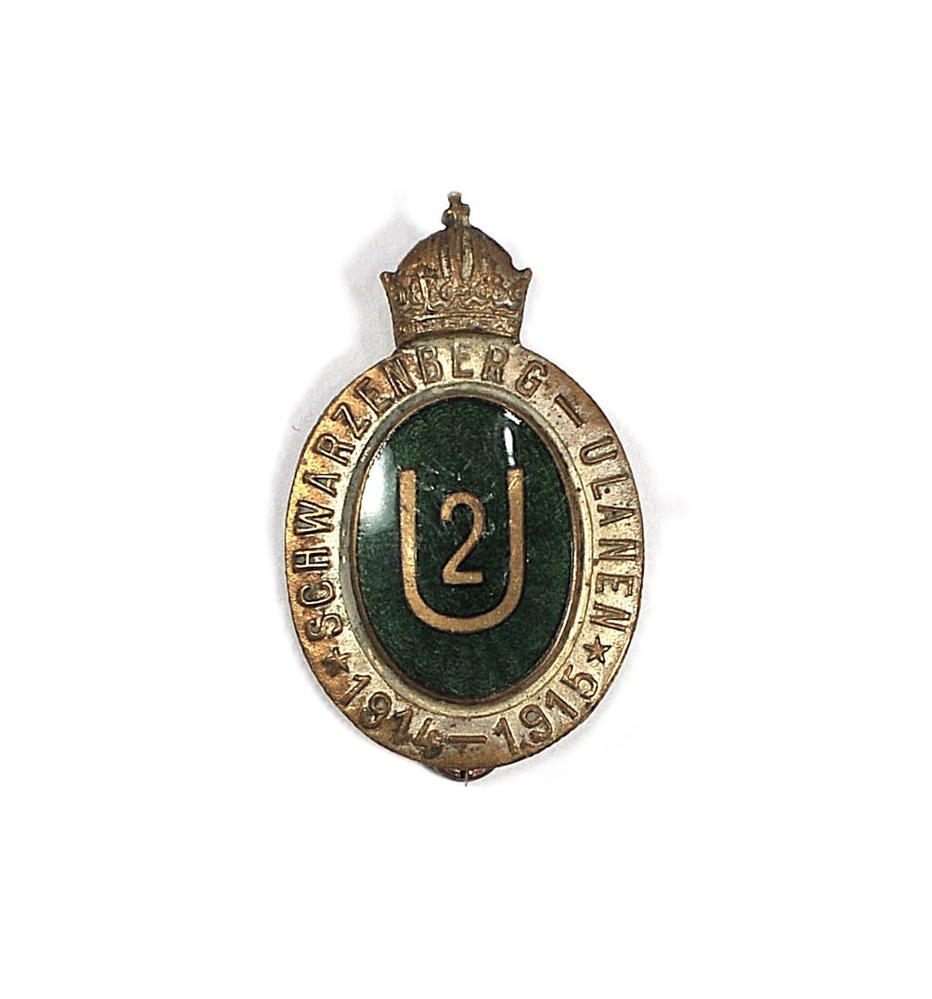 Austro-Hungarian WWI Schwarzenberg Uhlan Regiment No. 2 Enamel Badge, 1914–1915: Original cap badge (Kappenabzeichen) for the Imperial and Royal Uhlan Regiment "Prince of Schwarzenberg" No. 2, which served in the Austro-Hungarian Army during World War I. It features an oval green 