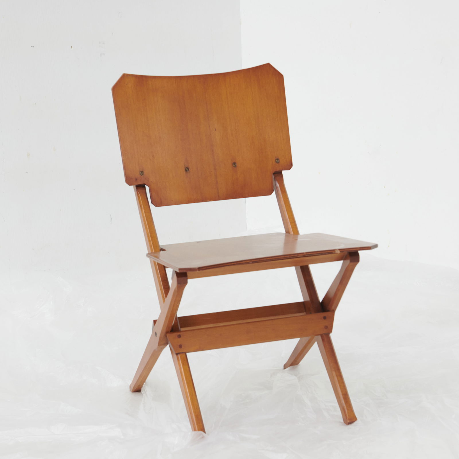 Franco Albini for Poggi, Folding Chair: Franco Albini for Poggi, Folding Chair, Italy, circa 1954mahogany, mahogany plywood, brass. 30.25 h x 17.5 w x 22 d in (77 x 44 x 56 cm)