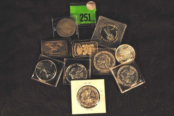 Lot of 10: Silver Eagle Bullion Coins. .999/1000 : Lot of 10: Silver Eagle Bullion Coins. .999/1000 parts silver. (1) Silver Ingot Coins God, Family Country, one troy ounce each. (3) 1987 dollars one troy ounce fine silver each; (1) 1991 dollar 1 troy
