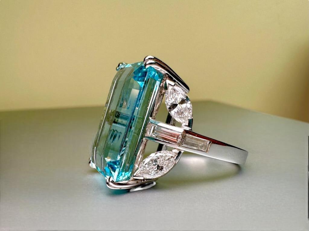Majestic GRS Certified Pastel Blue Aquamarine and 2ct Diamonds set on 18k Solid white gold 80s Ring: Majestic GRS Certified Pastel Blue Aquamarine and 2ct Diamonds set on 18k Solid white gold 80s Ring GRS Certified 21.5ct Pastel Blue Aquamarine 2.00ct Natural Diamonds(4 baguette + 4 marquise) Weight: