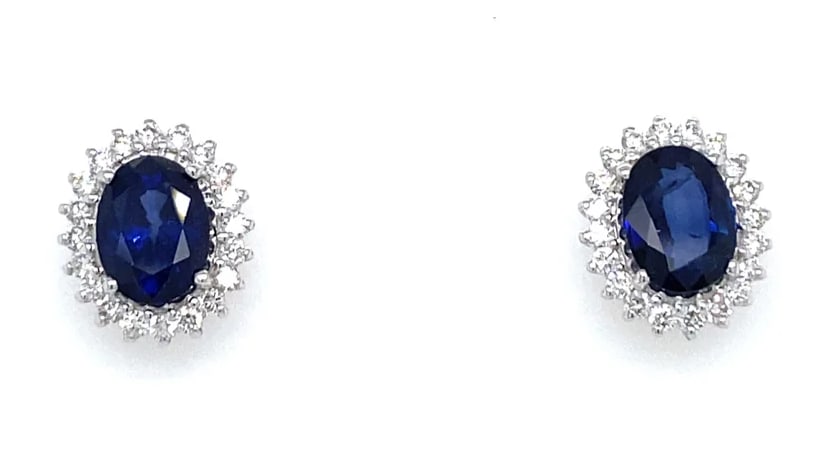 18K White Gold Sapphire & Diamond Cluster Earrings 2.41ct Sapphires, 2.6g: Exquisite vintage earrings handcrafted in solid 18K white gold, featuring vivid natural sapphires at the center with a total weight of 2.41 carats. Each sapphire is encircled by a sparkling halo of co