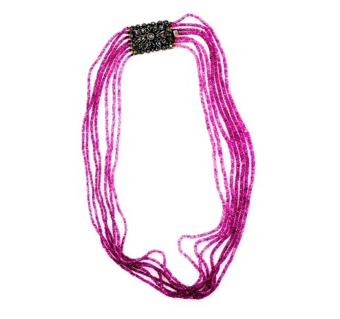 280ct Ruby Bead Multi-Strand Necklace with Victorian 12k Clasp, 76g: A striking multi-strand necklace composed of six rows of vibrant ruby beads with a total weight of 280 carats. The rich color and natural sparkle of the rubies are beautifully complemented by an authe