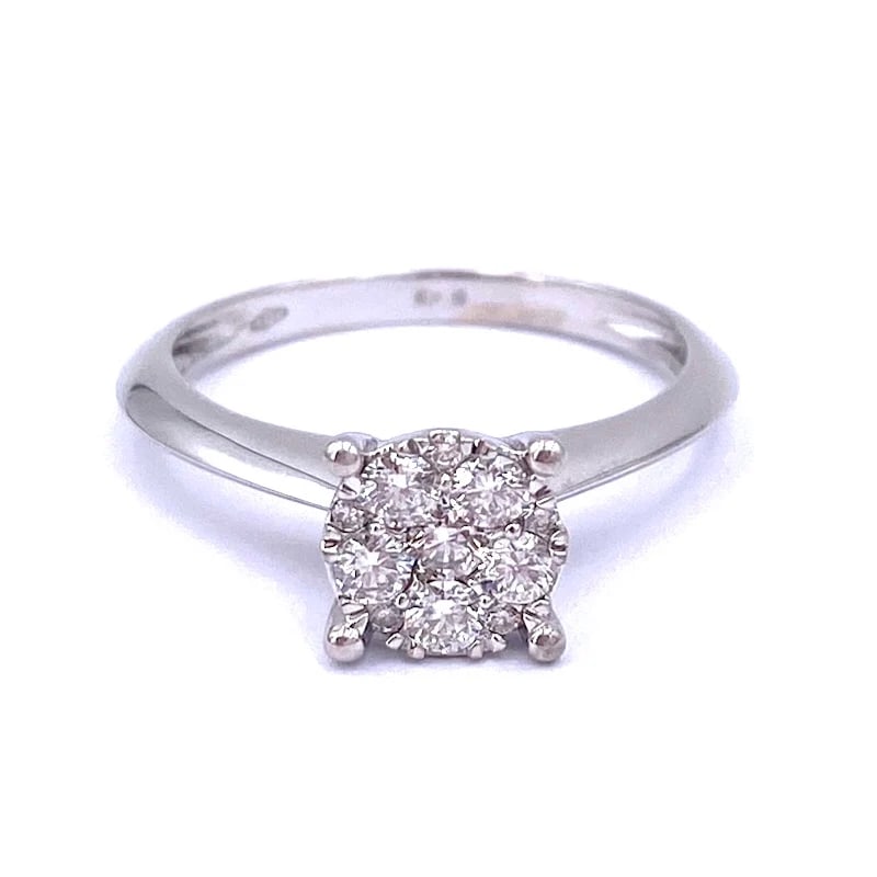 Exquisite White Gold 18kt Ring with Radiant 0.34-0.44ct Diamonds Weighing 2.78: Exquisite white gold 18kt ring featuring a radiant arrangement of brilliant-cut diamonds in a circular design that creates the illusion of a single large gem. A timeless piece that exudes
