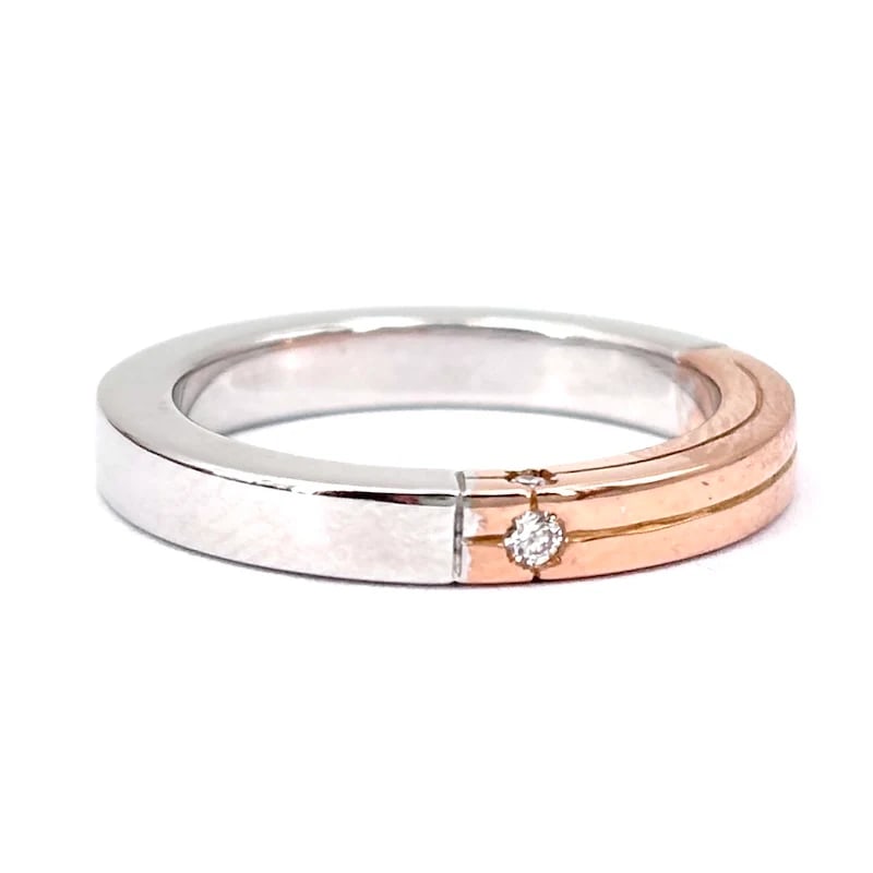 18K White and Rose Polello Signature Gold Band Ring with Three Radiant Diamonds 0.03ct tot, 5.91 gr: This refined band ring by Polello is crafted in solid 18K white and rose gold, featuring a clean squared profile and a comfortable, balanced structure. Three radiant diamonds, one centered on the fron