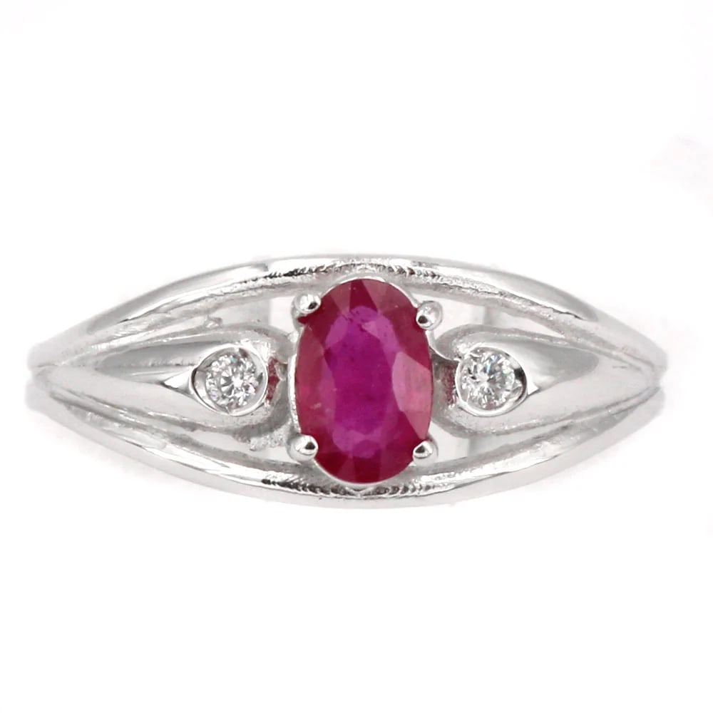 A Stylish 0.44ct Ruby is set on this 18K White Gold Band Ring with 0.04ct Side Diamonds, 2.44 gr (1 of 4)