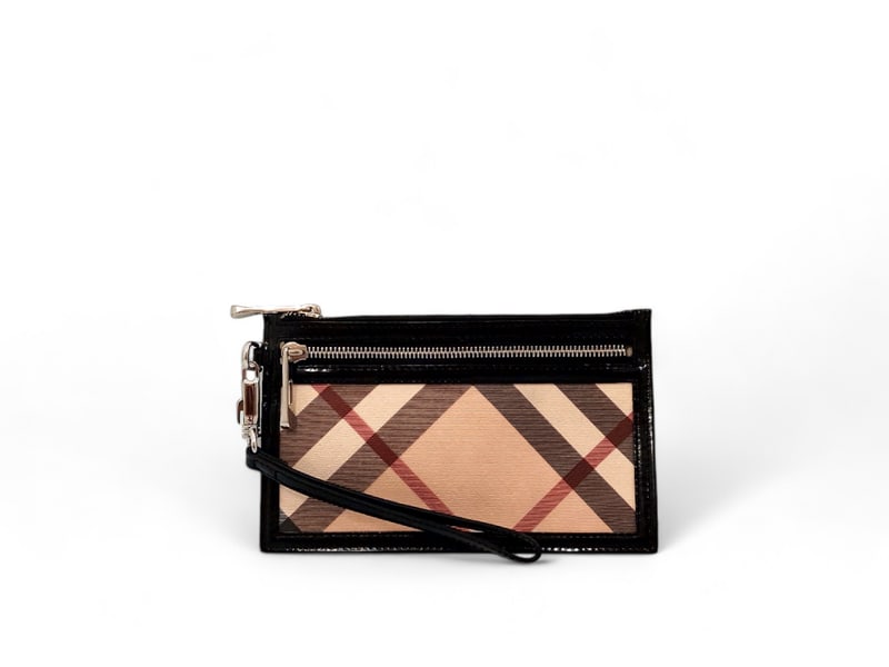 Burberry Canvas & Black Patent Pochette - Authentic Perfect Condition: Elegant Burberry pochette crafted from classic beige canvas with sophisticated black patent leather trim. Featuring sleek silver hardware, this slim accessory is perfect for carrying essentials with s