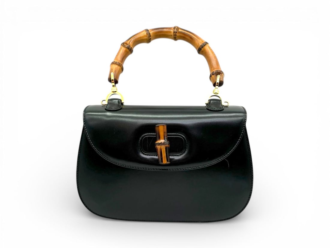 Tom Ford - Gucci Bamboo Calfskin Handbag - Distinguished & Timeless Masterpiece: A distinguished Tom Ford - Gucci handbag from the turn of the millennium, crafted from exceptionally fine black calfskin. The legendary Bamboo handle and radiant gold hardware create a silhouette of t