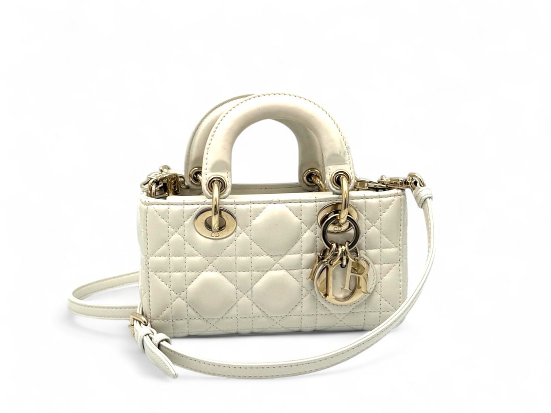 Dior Lady D-Joy Micro White Lambskin - Exquisite & Luminous Mini Jewel: The breathtaking Dior Lady D-Joy Micro, a luminous masterpiece of the Maison's latest high-fashion evolution. Crafted from pristine white lambskin with iconic Cannage quilting and gold hardware, it is
