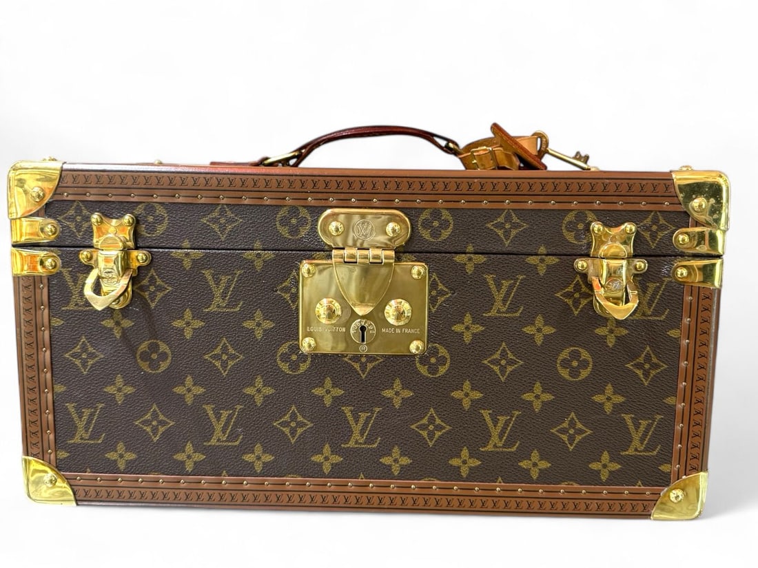 Louis Vuitton Boite Bouteilles et Glaces - Historic & Grand Beauty Trunk: The spectacular Louis Vuitton Boite Bouteilles et Glaces, a grand trunk designed for the ultimate in travel luxury. Crafted in iconic Monogram canvas with radiant gold hardware, this piece embodies th