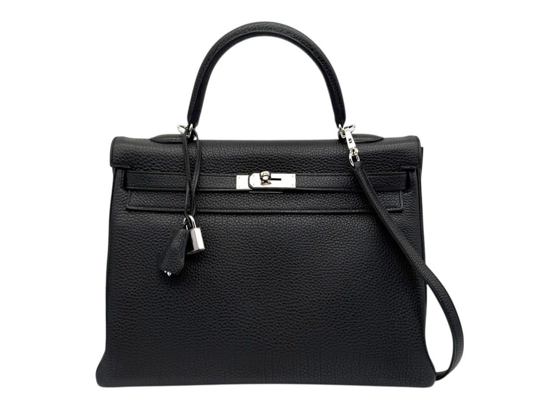 Hermes Kelly 35 Noir Togo - Timeless & Absolute Icon of Authority: The absolute icon of luxury: the Hermes Kelly 35 in deep Noir Togo leather, a masterpiece of enduring authority and style. Accented with sleek Palladium hardware, this structured piece represents the
