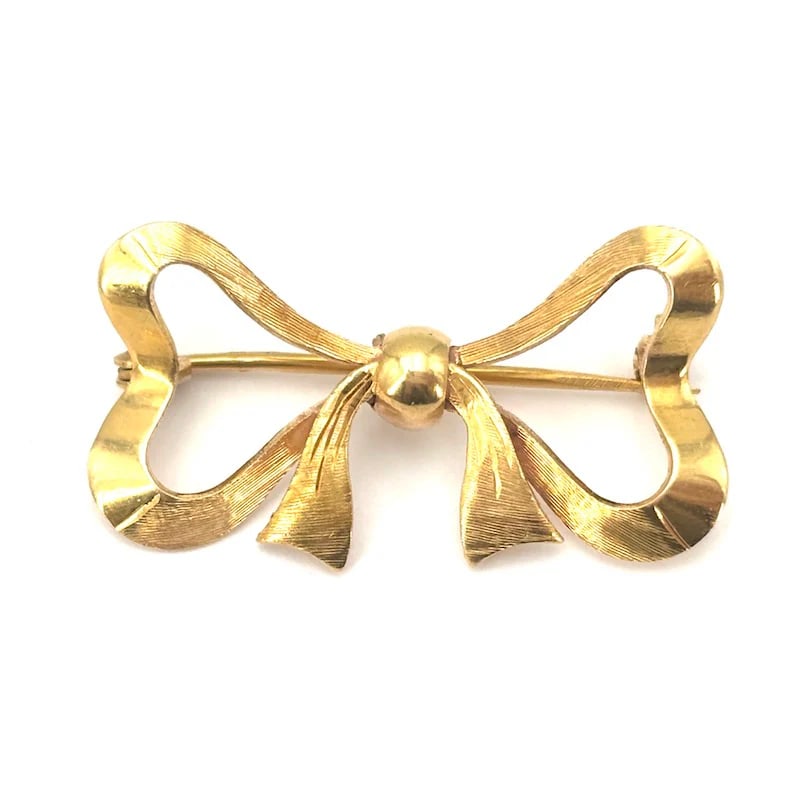 A graceful design for this Charming Vintage bow brooch in 18kt yellow gold weighing 4.34gr (1 of 5)