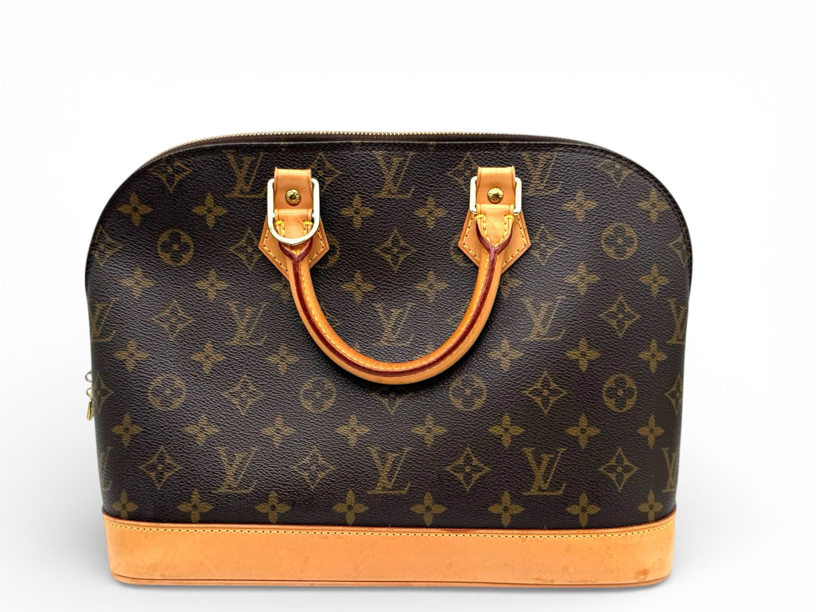 Louis Vuitton Alma Timeless Monogram Iconic Top Handle Elegance: An enduring icon of refined Parisian style, the Louis Vuitton Alma enchants with its graceful silhouette and legendary Monogram canvas. A sophisticated statement piece that blends heritage craftsmansh