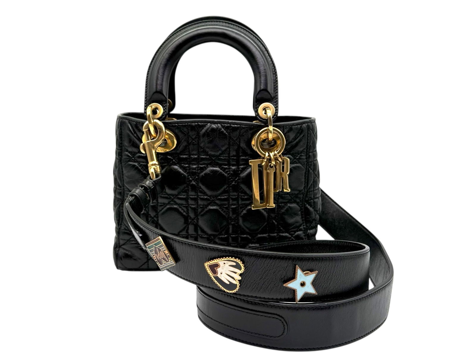 Dior Lady Dior Small Elegant Leather Shoulder Bag in Classic Black with Gold Hardware: Experience timeless elegance with the Dior Lady Dior Small, a refined leather bag that blends sophistication and versatile style effortlessly. Brand: Dior Type: Shoulder Bag / Crossbody Bag Material: