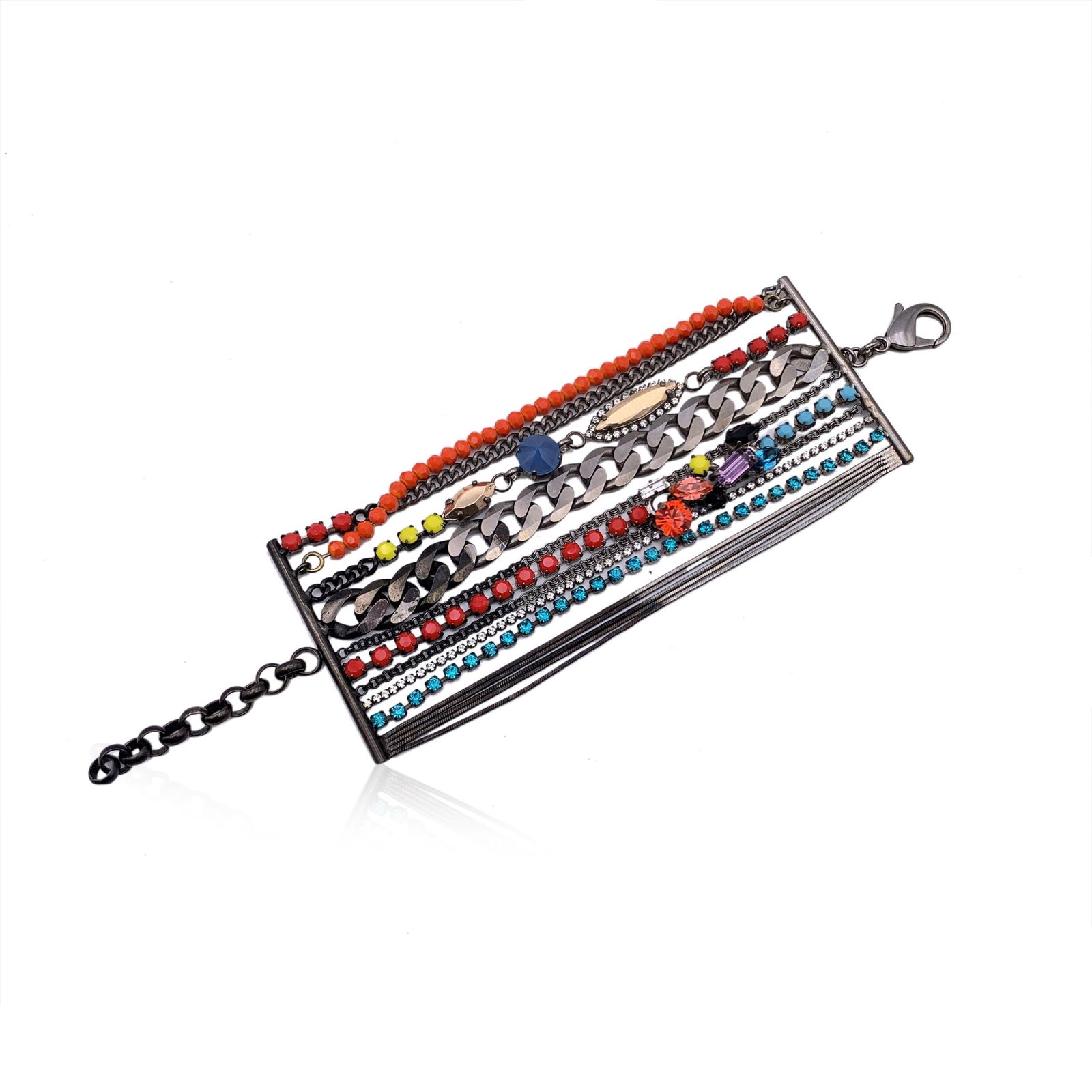 Iosseliani Metal Bracelet: Chic and eclectic, this Iosseliani multistrand chain bracelet embodies the brand's signature fusion of glamour and edge. Expertly crafted in silver-tone metal, it features an array of multicolored art