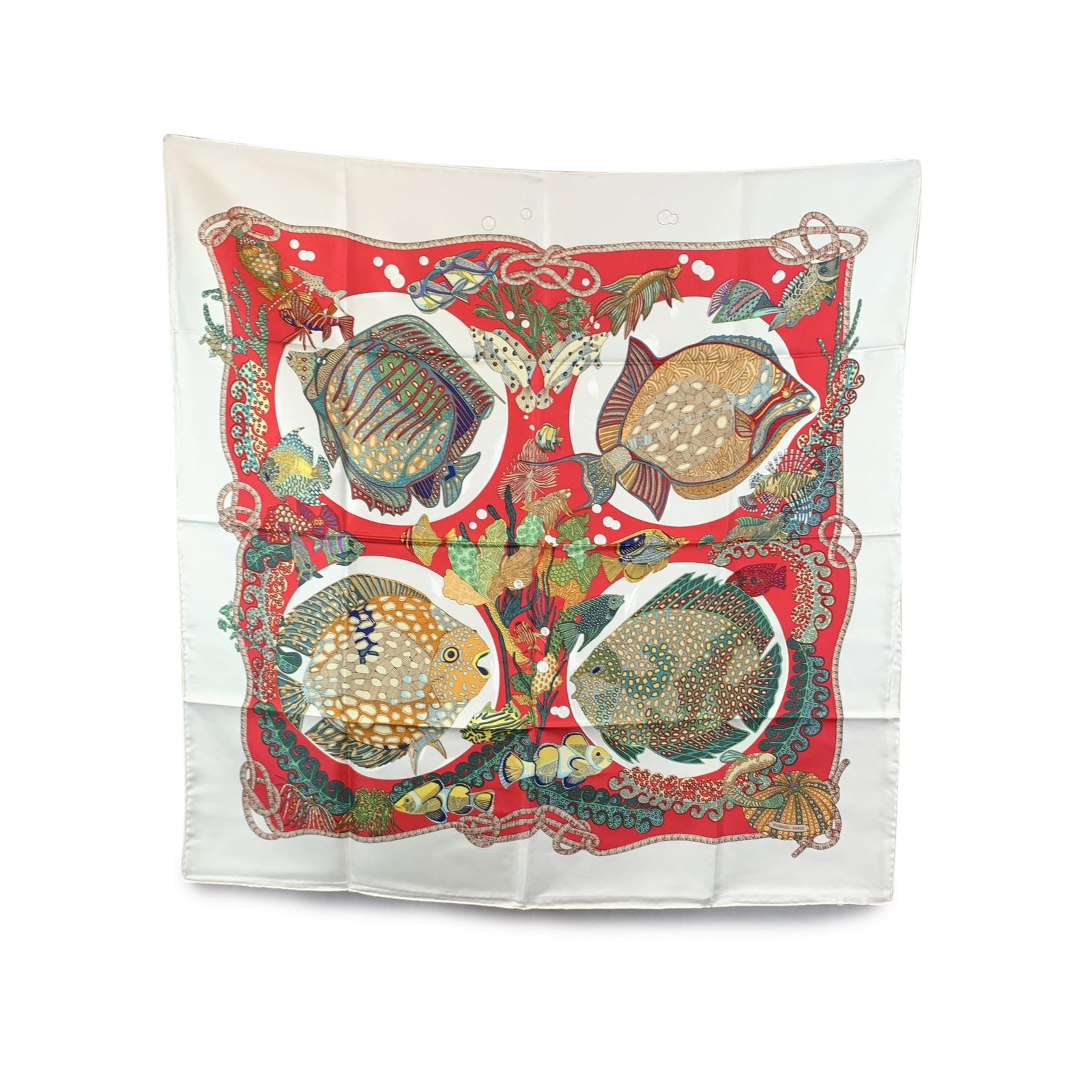 Hermes Vintage Silk Scarf Carre 90: This beautiful Hermes silk scarf, 'Grands Fonds' (Great Deeps), designed by Annie Faivre, is a stunning tribute to the vibrant and mysterious world beneath the sea. First issued in 1992, this design