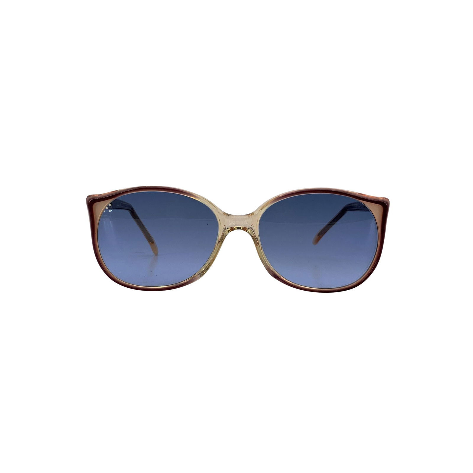 Yves Saint Laurent Vintage Plastic Sunglasses: There's a soft, poetic charm woven into the 1980s, and these vintage POMONE sunglasses by Yves Saint Laurent capture it perfectly. Made in France, the design features a gentle oval silhouette in lumin