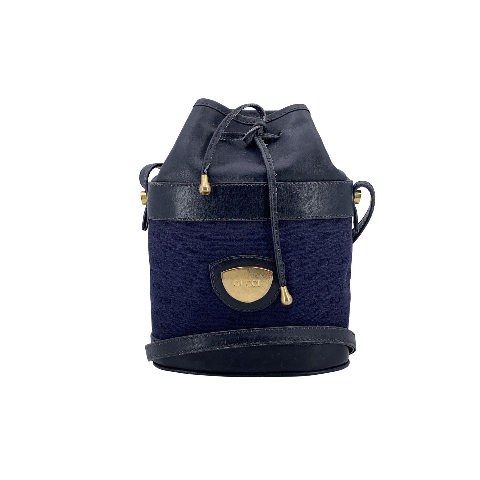 Gucci Vintage Cloth Crossbody Bag: Step into the charm of 1980s Italian luxury with this Gucci vintage mini bucket bag, a playful yet sophisticated piece that captures the brand's iconic flair. Crafted in blue micro GG monogram canvas,