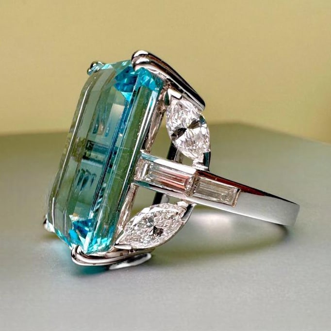 Majestic GRS Certified Pastel Blue Aquamarine and 2ct Diamonds set on 18k Solid white gold 80s Ring: Majestic GRS Certified Pastel Blue Aquamarine and 2ct Diamonds set on 18k Solid white gold 80s Ring GRS Certified 21.5ct Pastel Blue Aquamarine 2.00ct Natural Diamonds(4 baguette + 4 marquise) Weight: