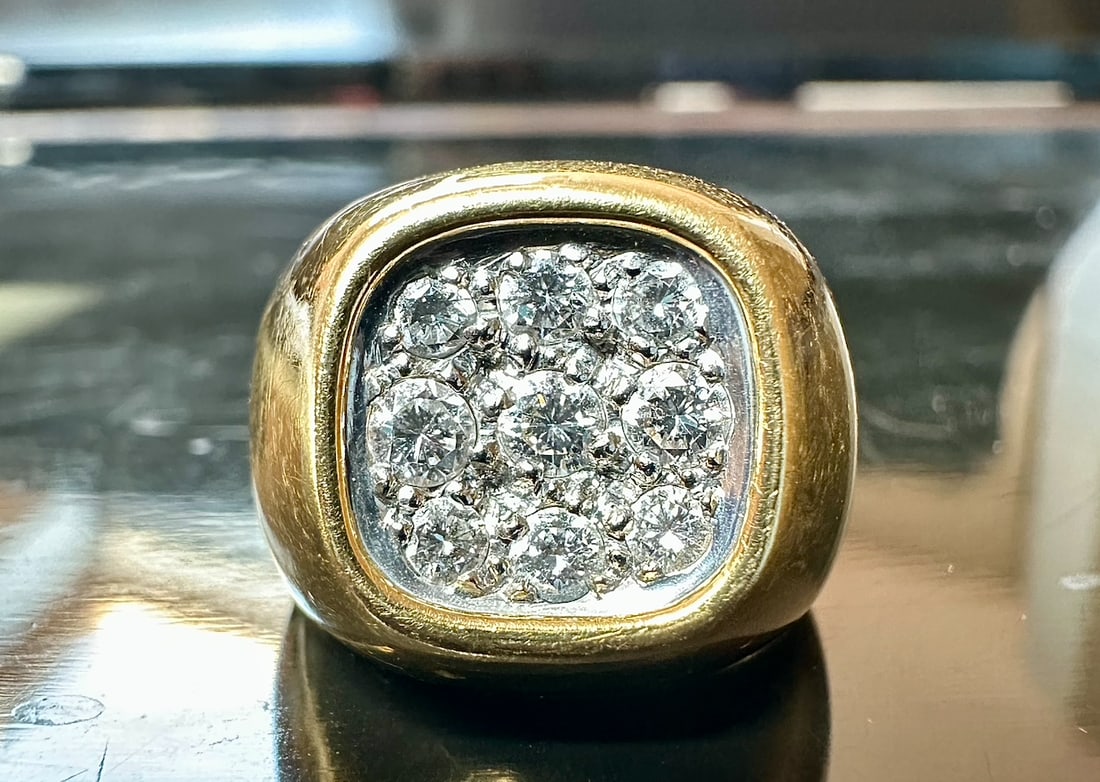 Classic and Impressive 70's 17gr 18k Solid gold Ring enriched with 9 ultra white diamonds: Classic and Impressive 70's 17gr 18k Solid gold Ring enriched with 9 ultra white diamonds diamonds: E/F VVSI 0,10-0,15ct each US 6,5 SKU: 116an weight: 17gr Our company's certification is available fo
