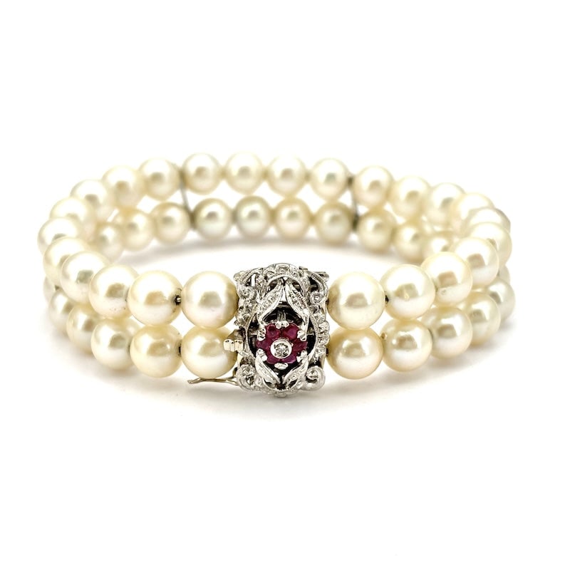 Rigid 2-strand pearl bracelet with vintage ruby and gold clasp; 17 cm - 35.7 gr. (1 of 11)