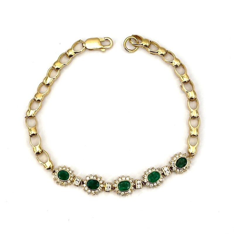 Emerald and diamond daisies bracelet, yellow gold chain; 12.6 gr.: Stunning bargain!!!! Very special and exquisite emeralds and brilliants daisy bracelet, mounted on 18 kt yellow gold chain. A very occasional, unique, sophisticated and special emerald bracelet varian