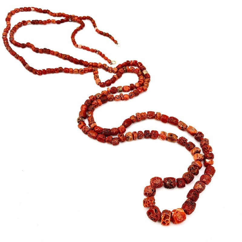 Scaled ethnic coral long necklace. 190 cm - 165 gr.: Beautiful and very long necklace of imperfect, perforated ethnic coral with irregular, scaled, endless barrels with yellow gold clasp. Scenic and very affordable! Our company's certification is availa