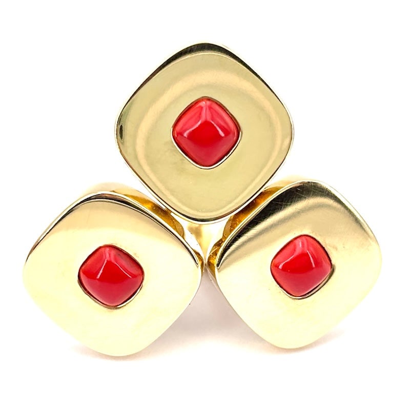 Gold and coral paste maxi design ring; 15.92 gr.: Exceptional maxi ring design, very occasional, with triple rounded square, made of 18 kt yellow gold, with red central coral pastes. Majestic, stylish, and super pop, yet comfortable and smooth at the
