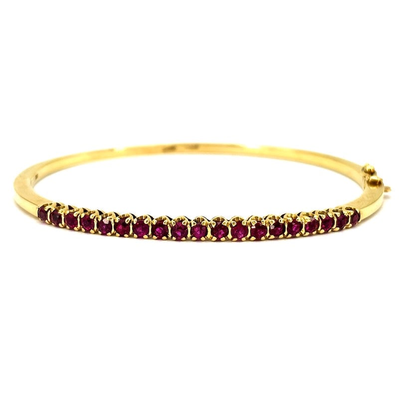 Yellow gold and ruby rigid tennis bracelet; 13.53 gr. (1 of 8)