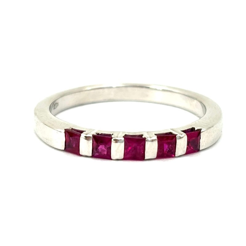 White gold wedding ring with square rubies; 4.45 gr.: Essential and intense white gold unisex wedding ring with hand-set rubies carre on mount created especially for them! A universal and fine ring, but absolutely handcrafted! Our company's certification