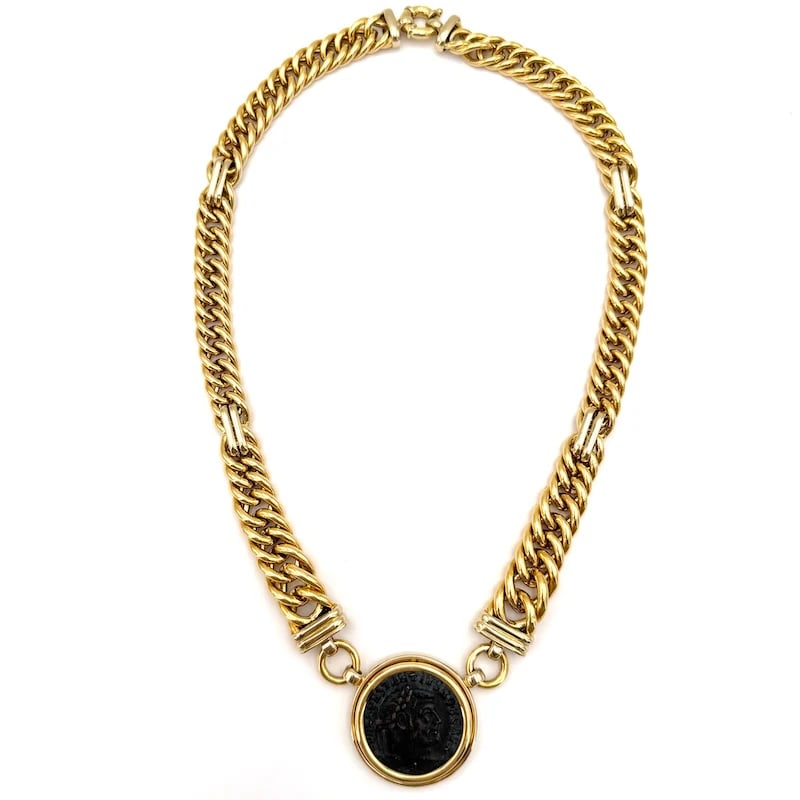 Striking 18K Yellow Gold Vintage Choker Necklace with Ancient Roman Coin Pendant - 68.47g: Striking 18K yellow gold vintage choker featuring a central ancient Roman coin, exuding timeless elegance and 1980s-inspired sophistication. Perfect for collectors or anyone appreciating historic and