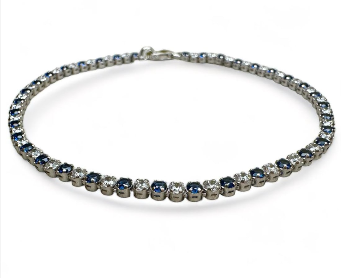 Elegant 9k solid gold Bracelet with wonderful Blu and white Cubic Zirconia: Elegant 9k solid gold Bracelet with wonderful Blu and white Cubic Zirconia Made in Italy Brand New with tag grams 2.8 SKU DZS