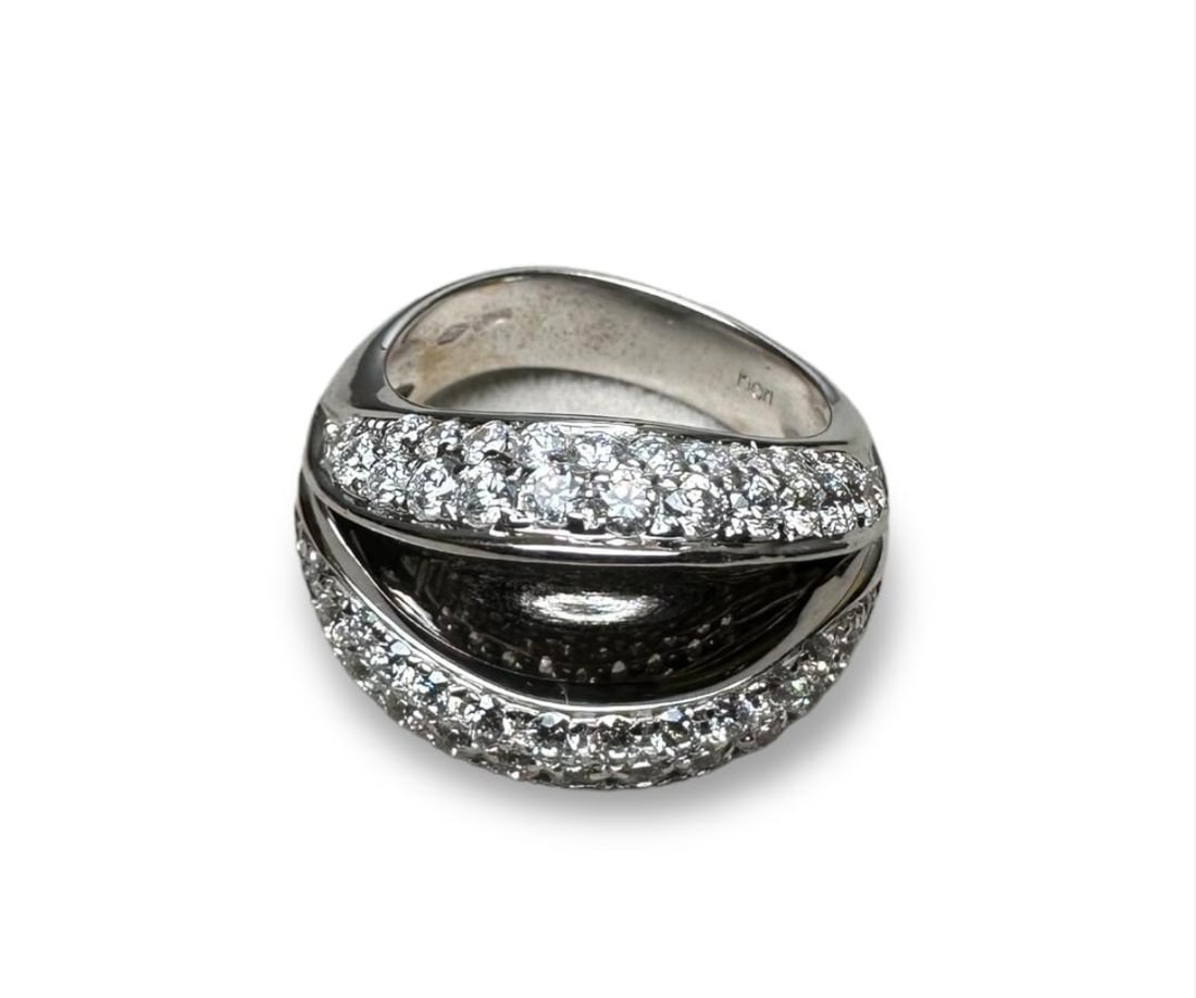 Impressive and elegant 13.9gr 18k Solid White Gold Ring enriched with natural diamonds: Impressive and elegant 13.9gr 18k Solid White Gold Ring enriched with natural diamonds Made in Italy in 90's Gr: 13,9 Size: Us 6 3/4 SKU: 55 Our company's certification is available for free, upon req