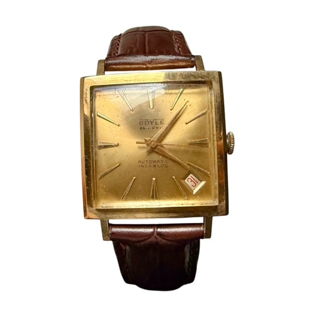 18k Solid Gold Doyle Manual winding date watch: 18k Solid Gold Doyle Manual winding date watch The watch is as you can see thru the pictures Case: 29x29mm case, crown not included perfectly working elegant - informal - rare and unobtainable object 