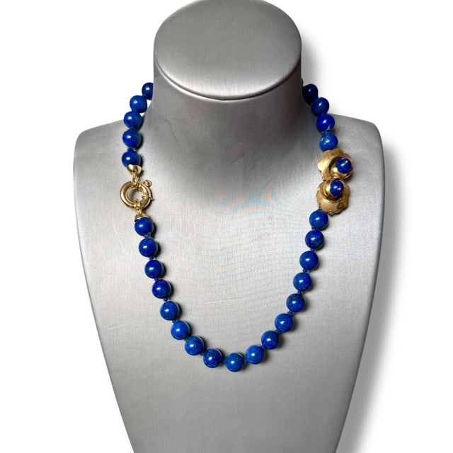 70's Timeless Beauty Necklace with Lapis Lazuli enriched on 18k Solid gold Huge pendant & clasp: 70's Timeless Beauty Necklace with extra quality Lapis Lazuli enriched with 18k Solid gold Huge pendant & clasp Made in Italy Over 20gr of 18k solid gold, including clasp and pendant SKU: 138 Our Comp