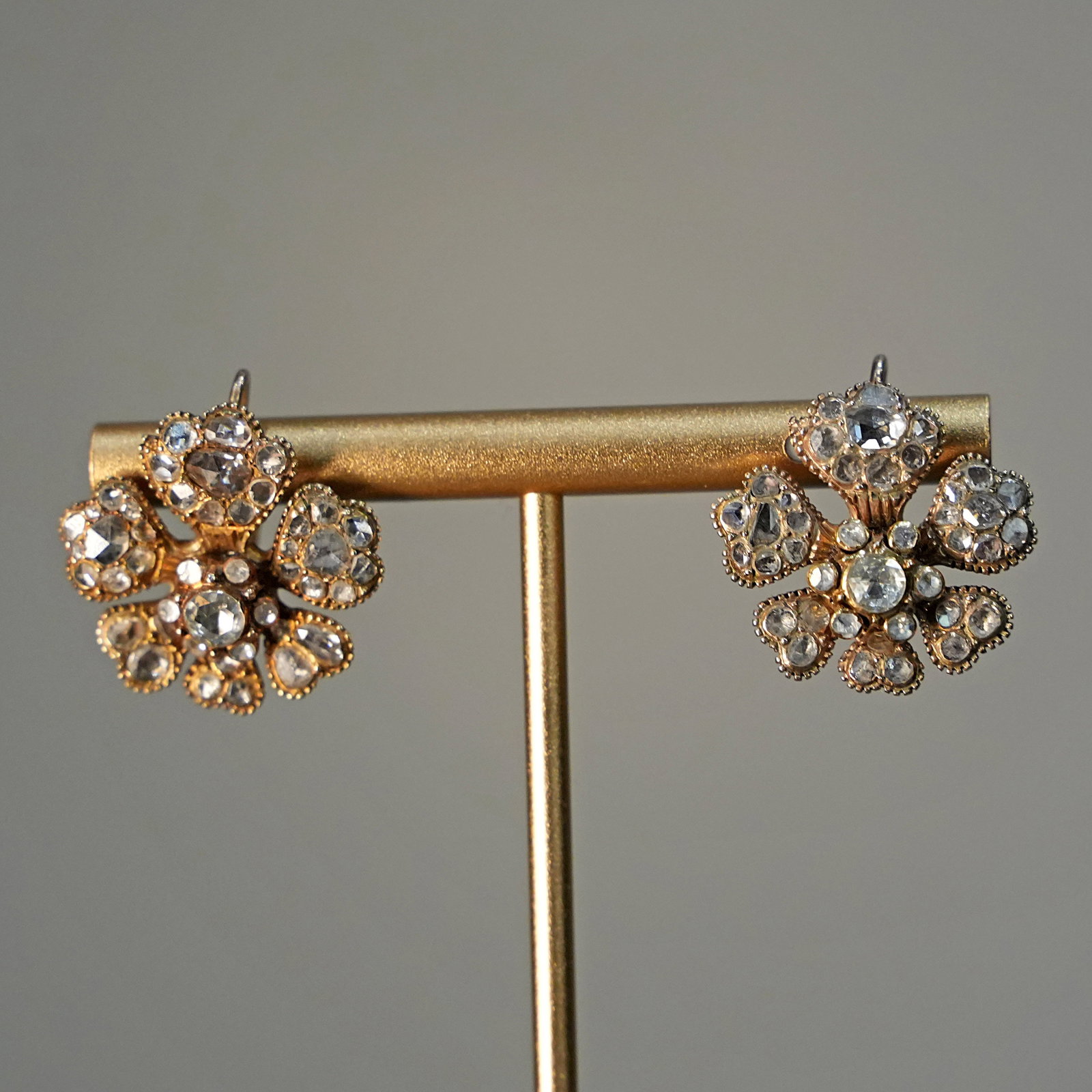 Vintage Goldsmith Masterpiece 18K Yellow Gold Stud Earrings with Sculpted Floral Rosettes, 14K: 18K yellow gold stud earrings showcasing timeless vintage goldsmith craftsmanship with 14K leverback closure. The floral design features five meticulously crafted petals opening around a central pisti